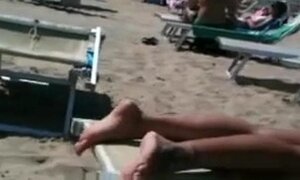 Big ass milf on the beach