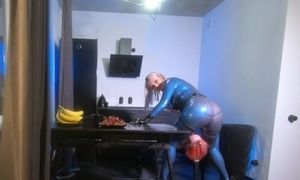 'Lesbian strapon suck in latex rubber, curvy Mistress playing with her toy girl, ass worship fetish'