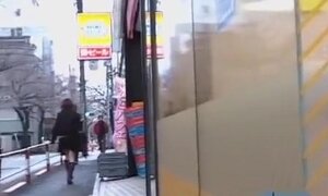Cute Asian girl gets a skirt sharking on the street.