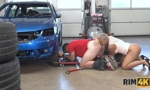 Short haired blonde MILF is licking the car mechanic