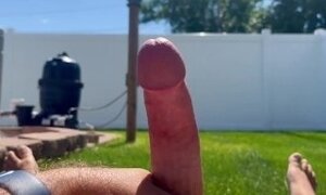 Bearded and tattooed husband jerks off outside to video of MILF wife with cumshot on self